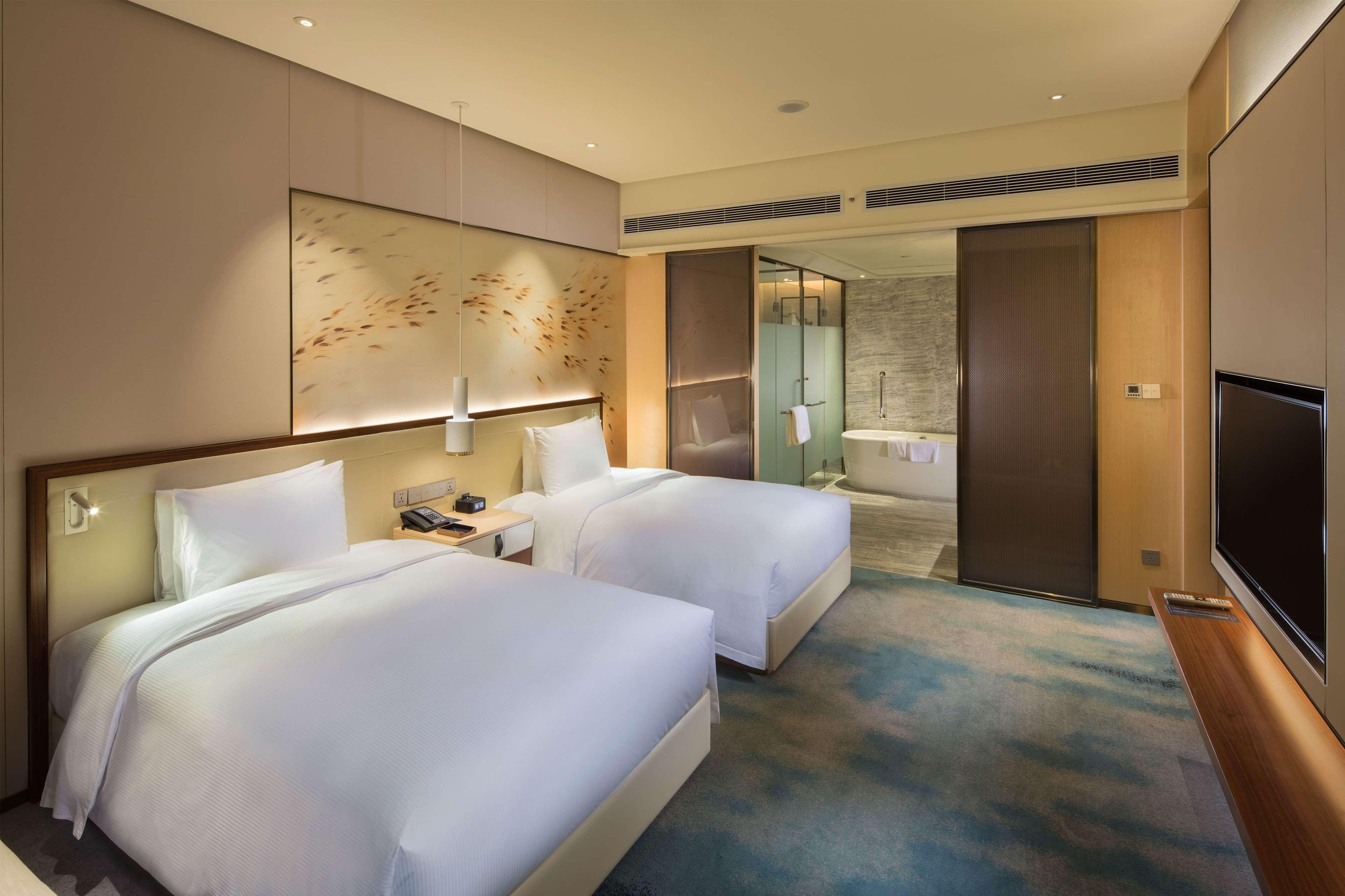 ฮิลตัน ฉวนโจว ริเวอร์ไซด์ Hotel เฉวียนโจว ภายนอก รูปภาพ