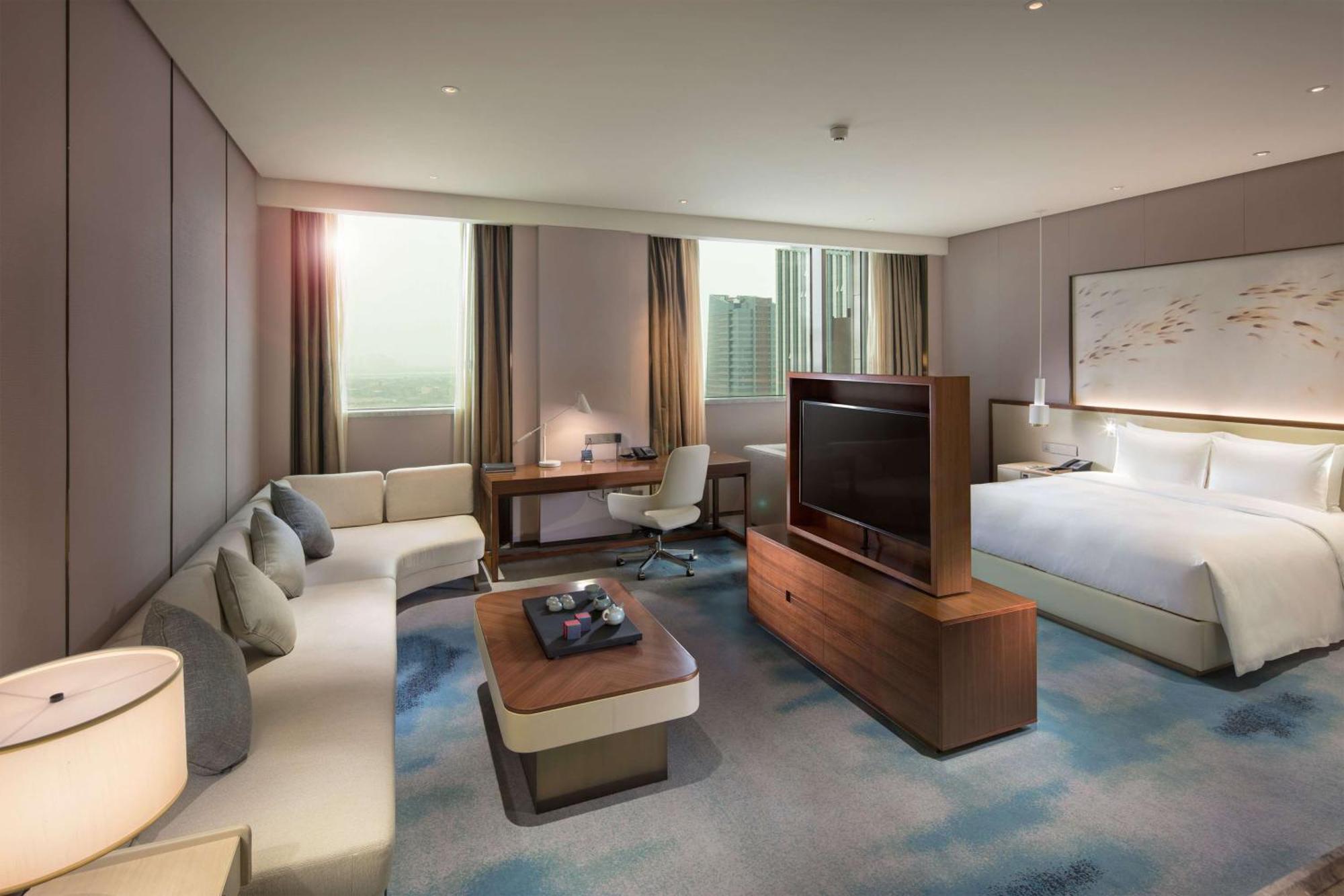 ฮิลตัน ฉวนโจว ริเวอร์ไซด์ Hotel เฉวียนโจว ภายนอก รูปภาพ
