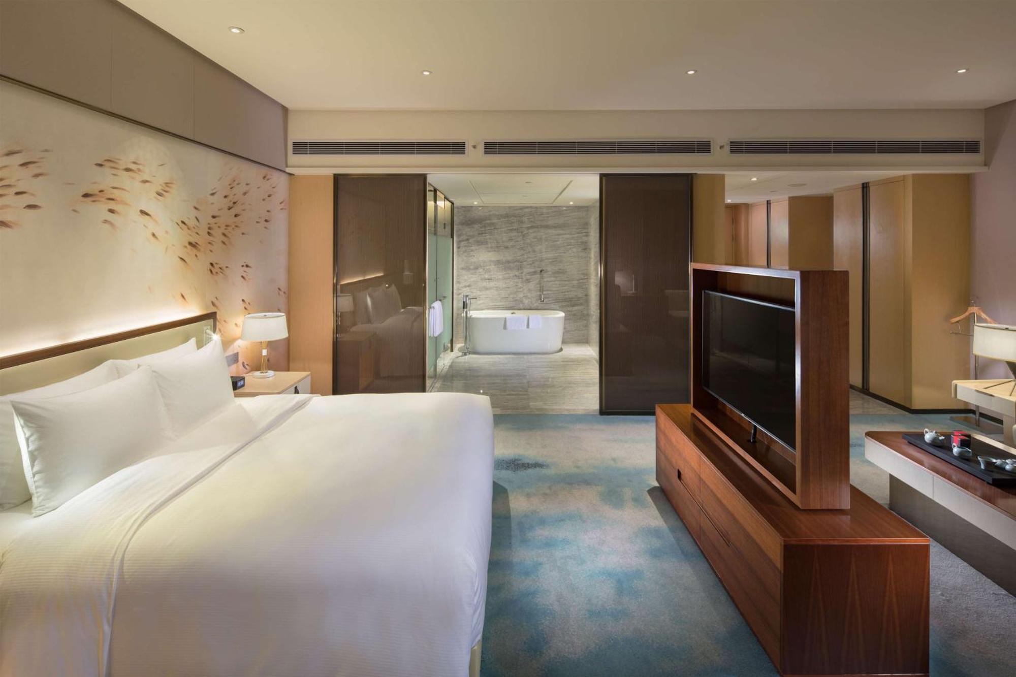 ฮิลตัน ฉวนโจว ริเวอร์ไซด์ Hotel เฉวียนโจว ภายนอก รูปภาพ