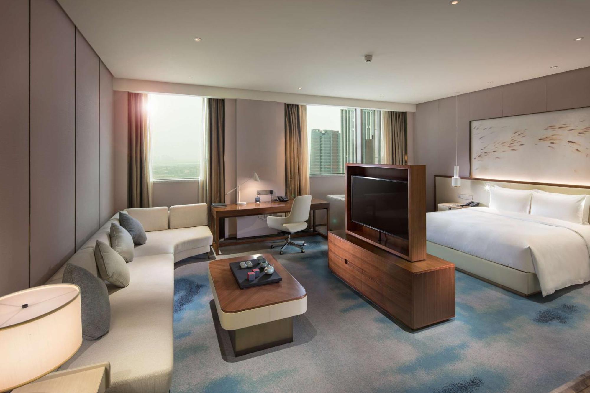 ฮิลตัน ฉวนโจว ริเวอร์ไซด์ Hotel เฉวียนโจว ภายนอก รูปภาพ