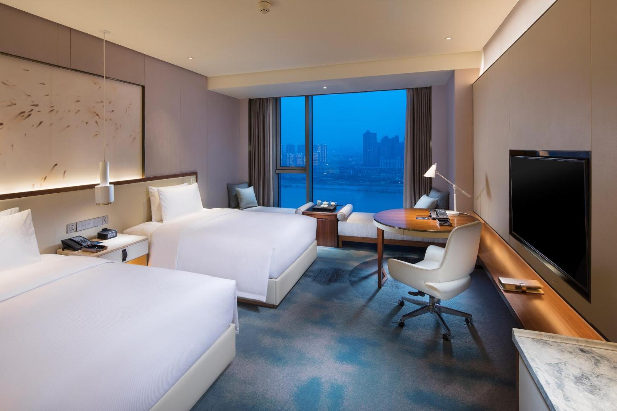 ฮิลตัน ฉวนโจว ริเวอร์ไซด์ Hotel เฉวียนโจว ภายนอก รูปภาพ