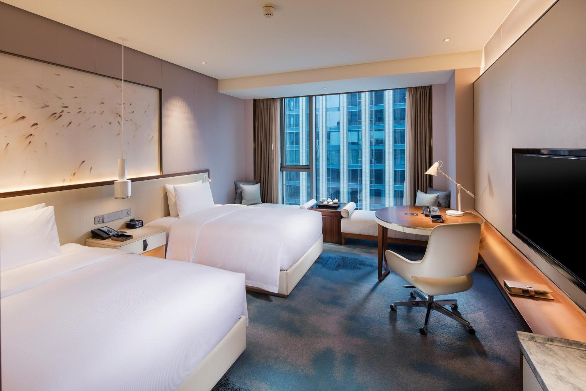 ฮิลตัน ฉวนโจว ริเวอร์ไซด์ Hotel เฉวียนโจว ภายนอก รูปภาพ