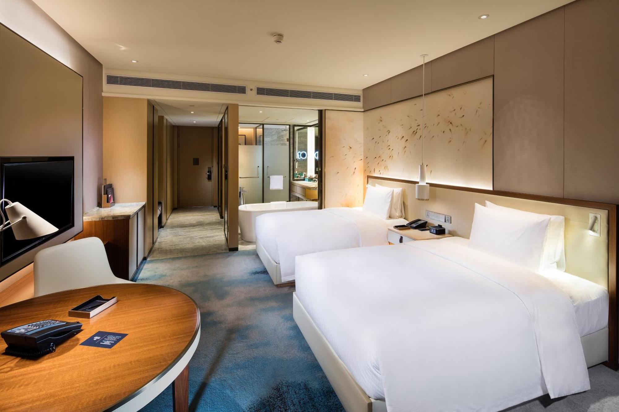 ฮิลตัน ฉวนโจว ริเวอร์ไซด์ Hotel เฉวียนโจว ภายนอก รูปภาพ