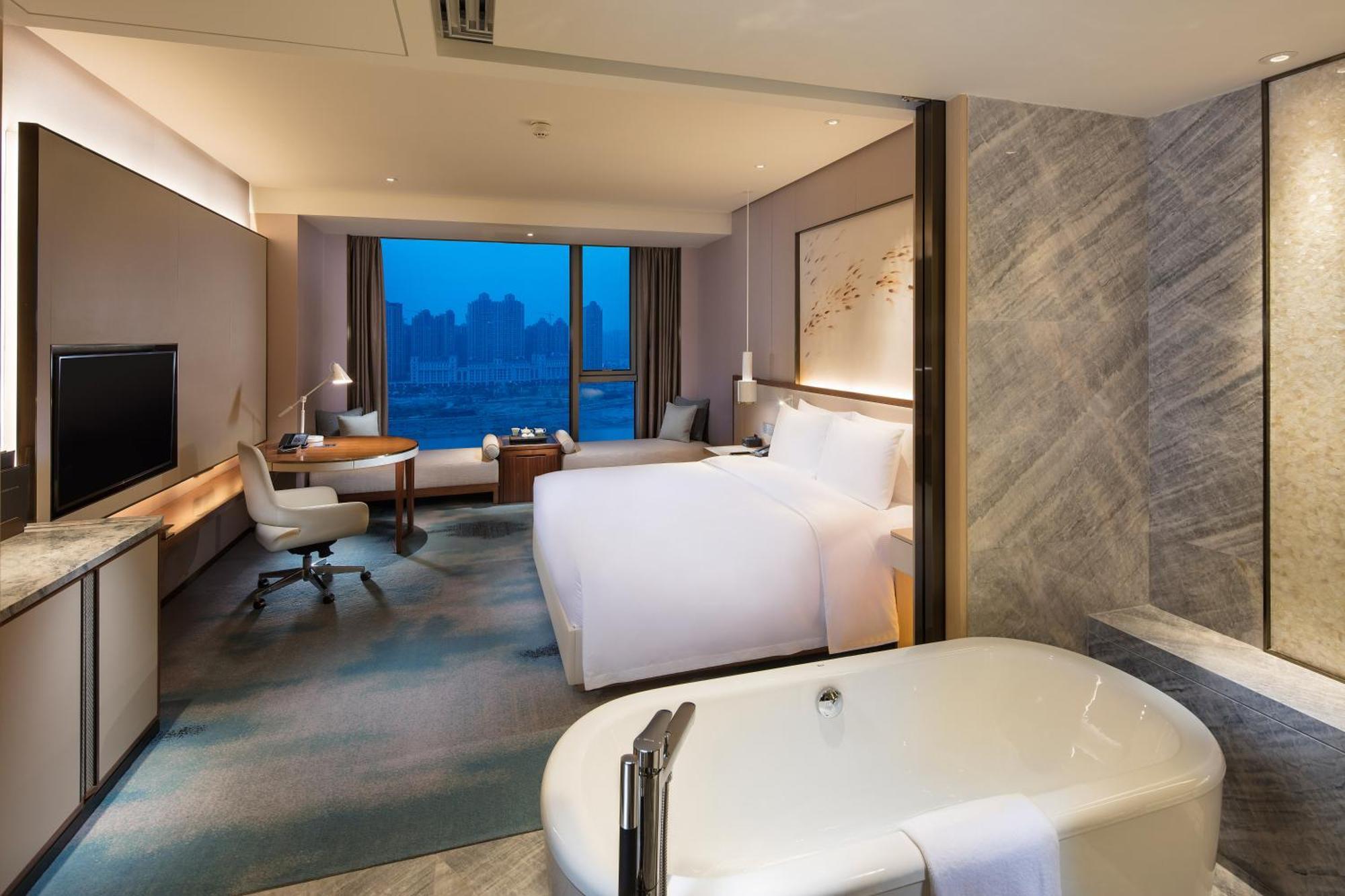 ฮิลตัน ฉวนโจว ริเวอร์ไซด์ Hotel เฉวียนโจว ภายนอก รูปภาพ