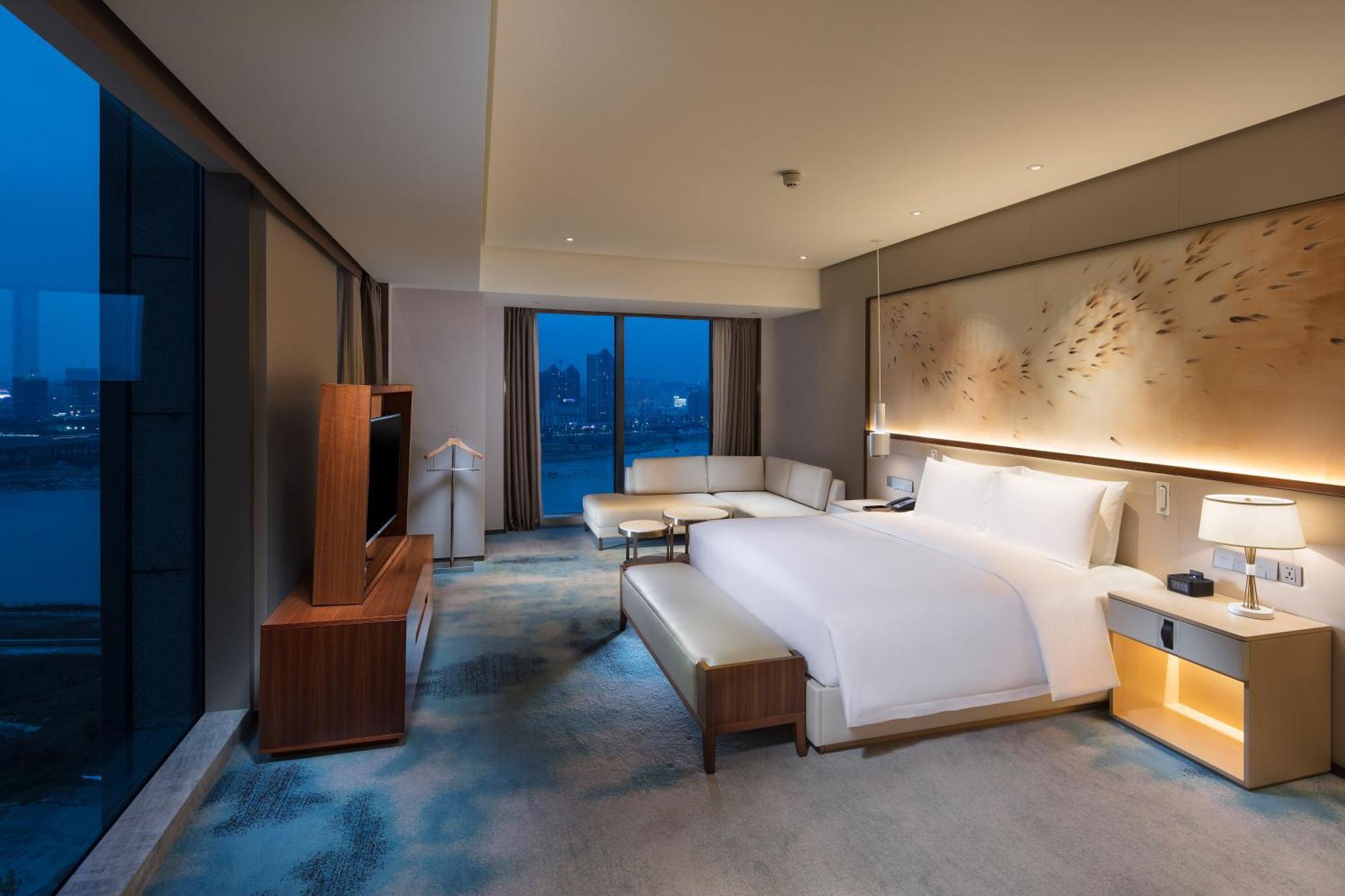 ฮิลตัน ฉวนโจว ริเวอร์ไซด์ Hotel เฉวียนโจว ภายนอก รูปภาพ