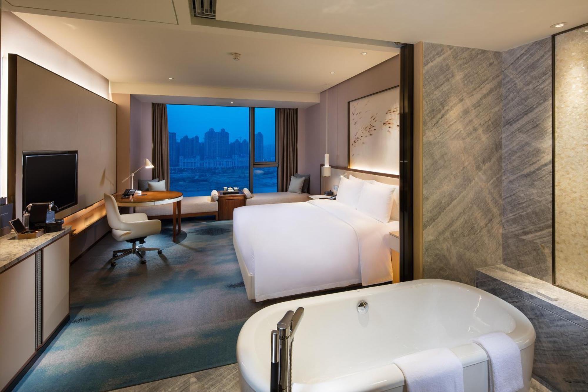 ฮิลตัน ฉวนโจว ริเวอร์ไซด์ Hotel เฉวียนโจว ภายนอก รูปภาพ
